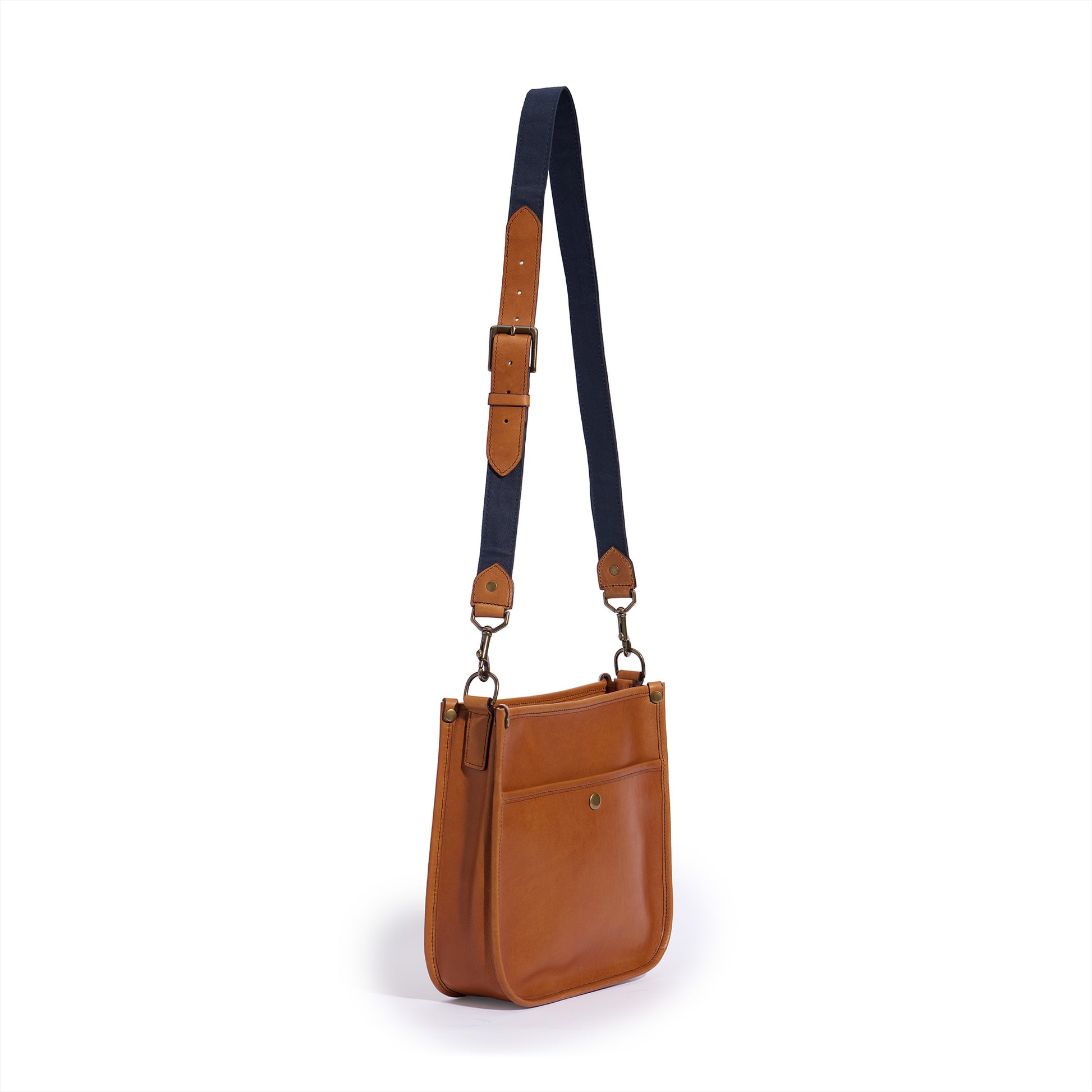 Jackson Wayne Cumberland Crossbody bag for women - saddle tan leather with midnight blue canvas and leather strap