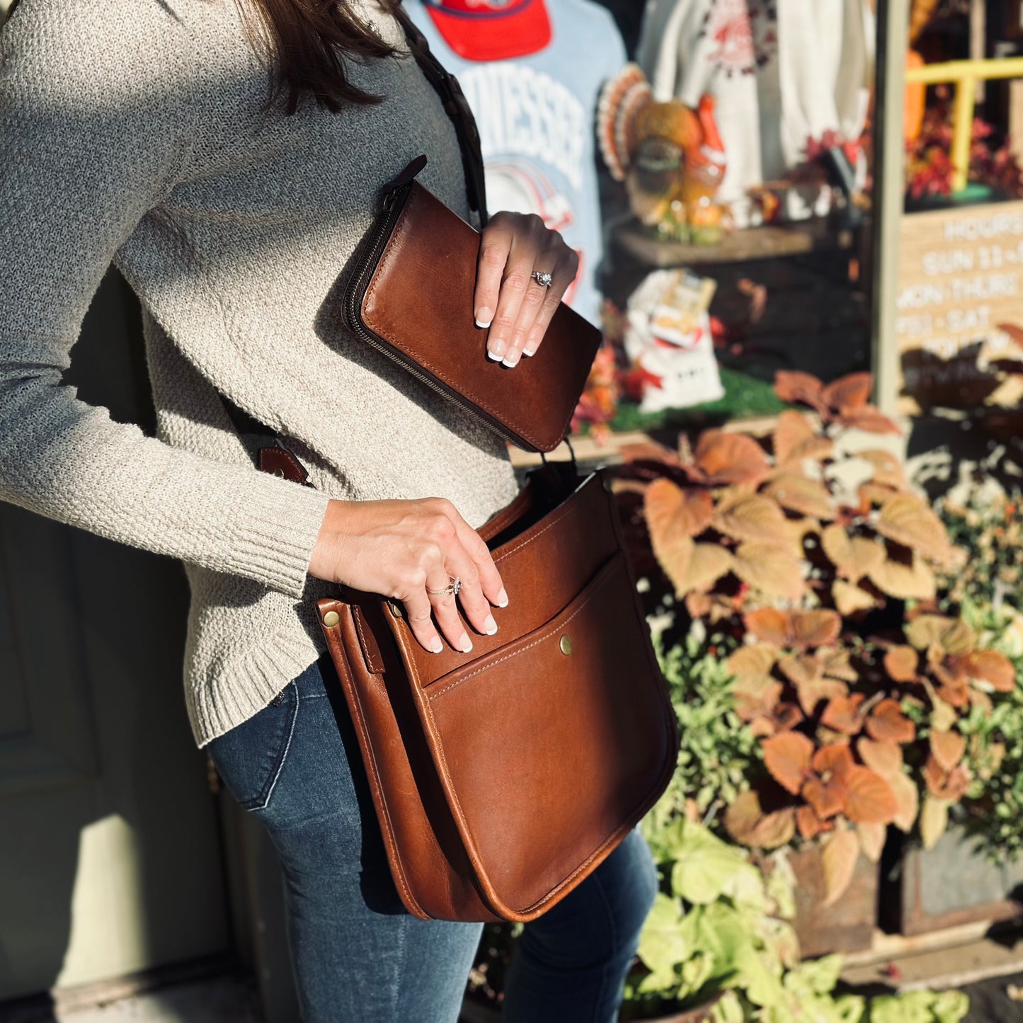 Jackson Wayne Williamson Wallet in full grain leather vintage brown color near crossbody bag