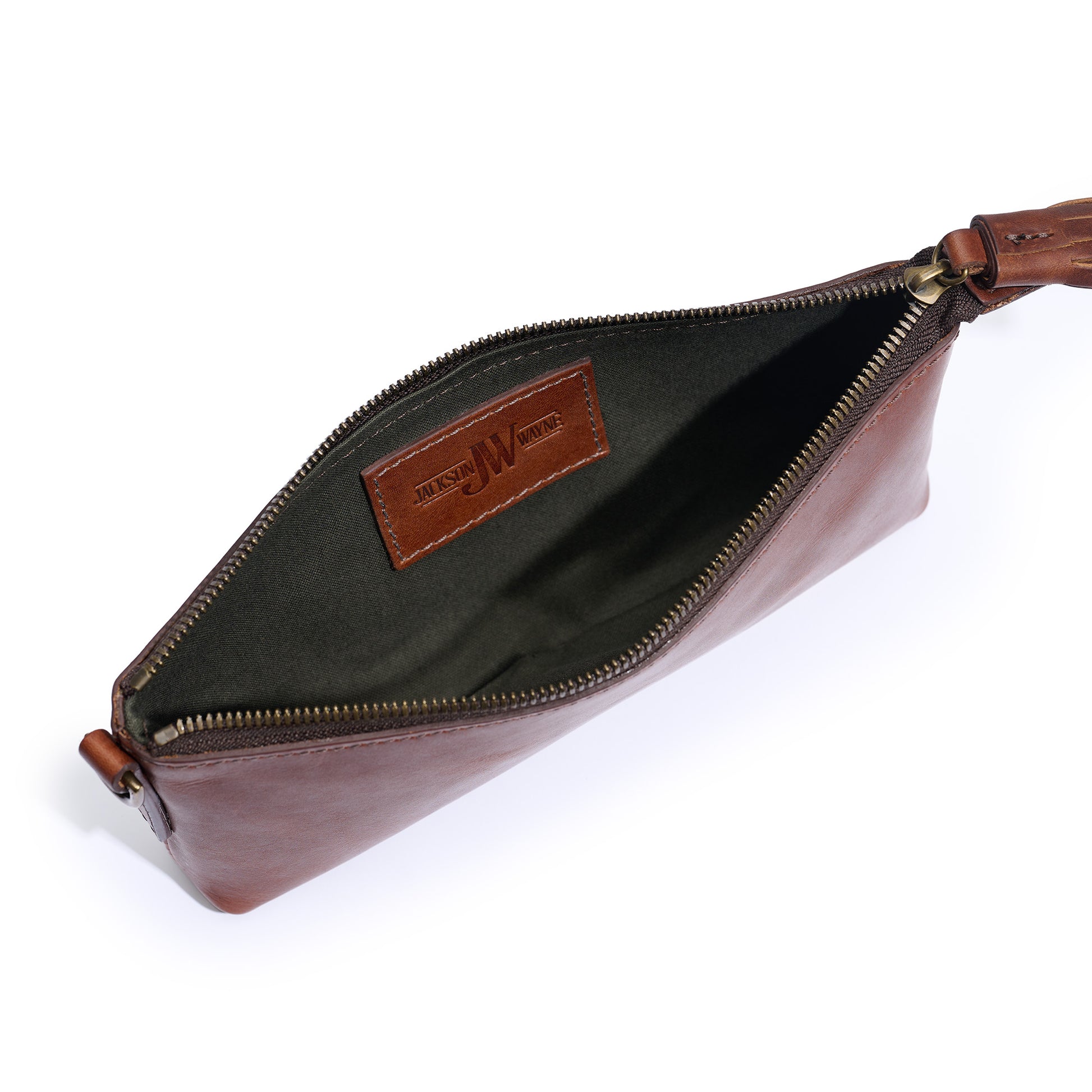 inside vintage brown leather broadway wristlet with pine green lining