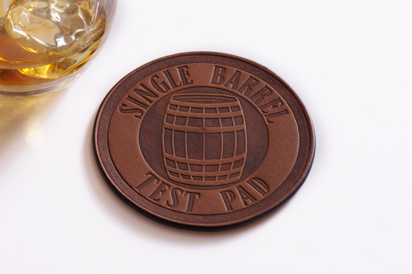 leather coasters with single barrel design and whiskey glass