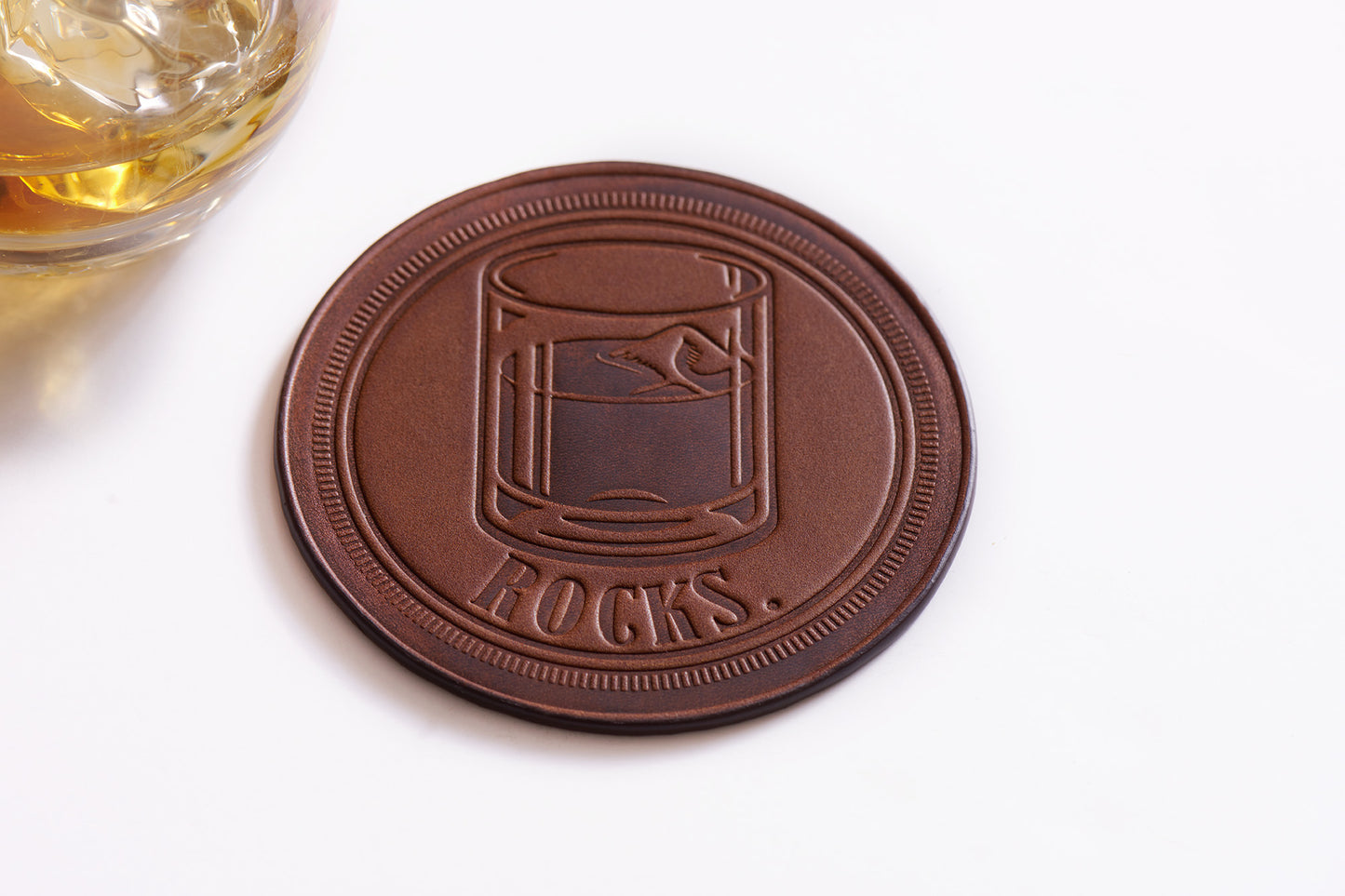 full grain leather coasters with rocks glass whiskey