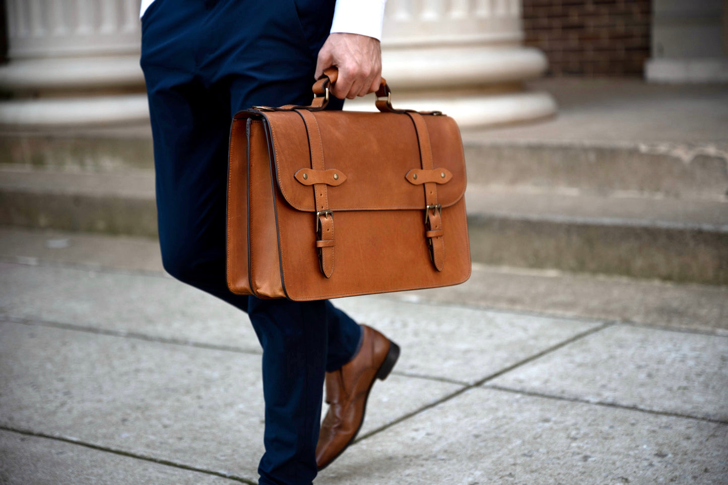 Jackson Wayne Esq. Briefcase Saddle Tan full grain leather on courthouse steps - lawyer or law school graduation gift