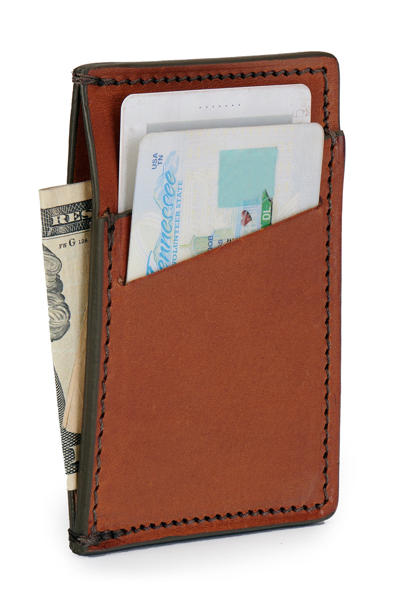 minimalist wallet in full grain vegetable tanned leather saddle tan color angle