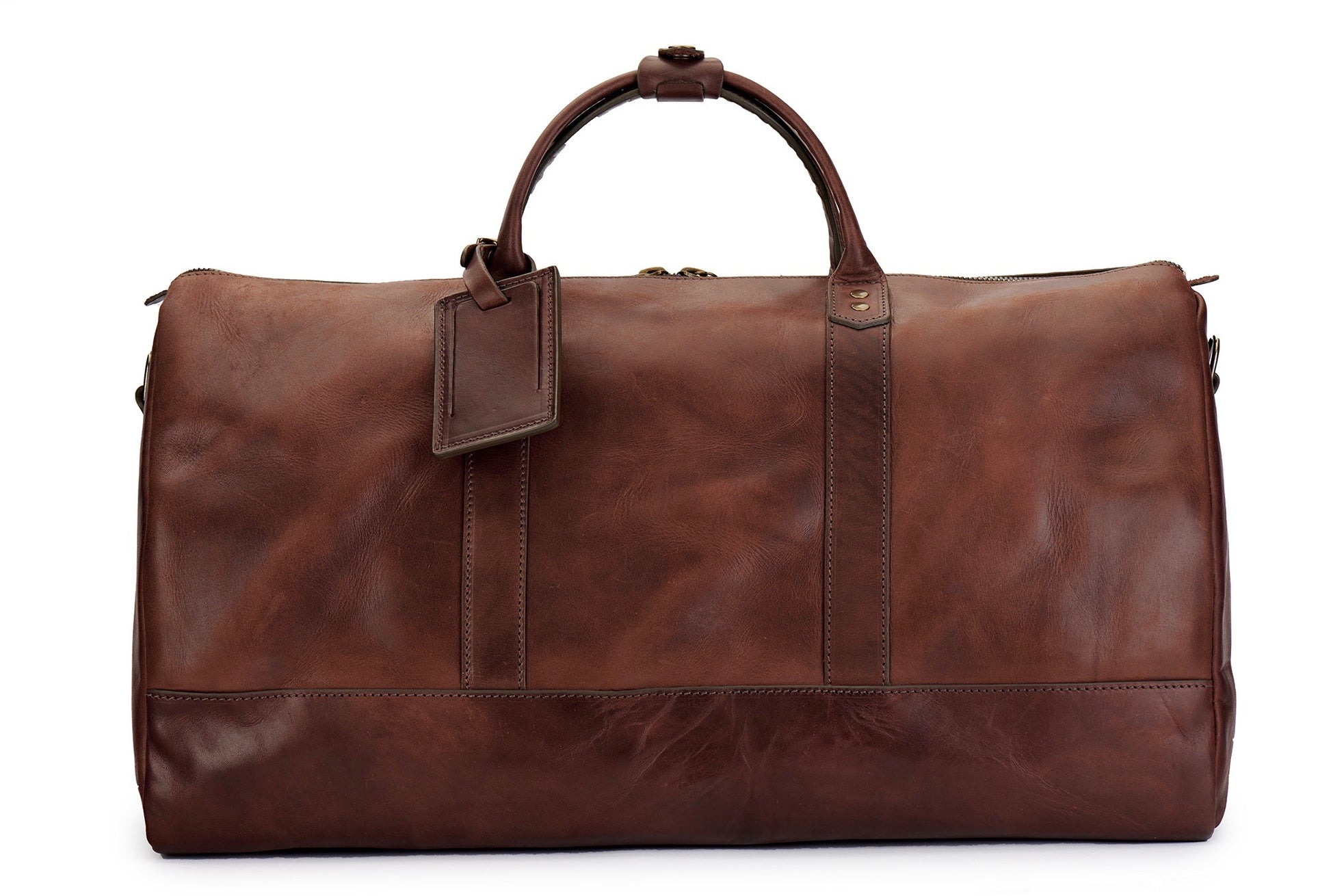 saddle tan full grain leather weekender bag with luggage tag in vintage brown