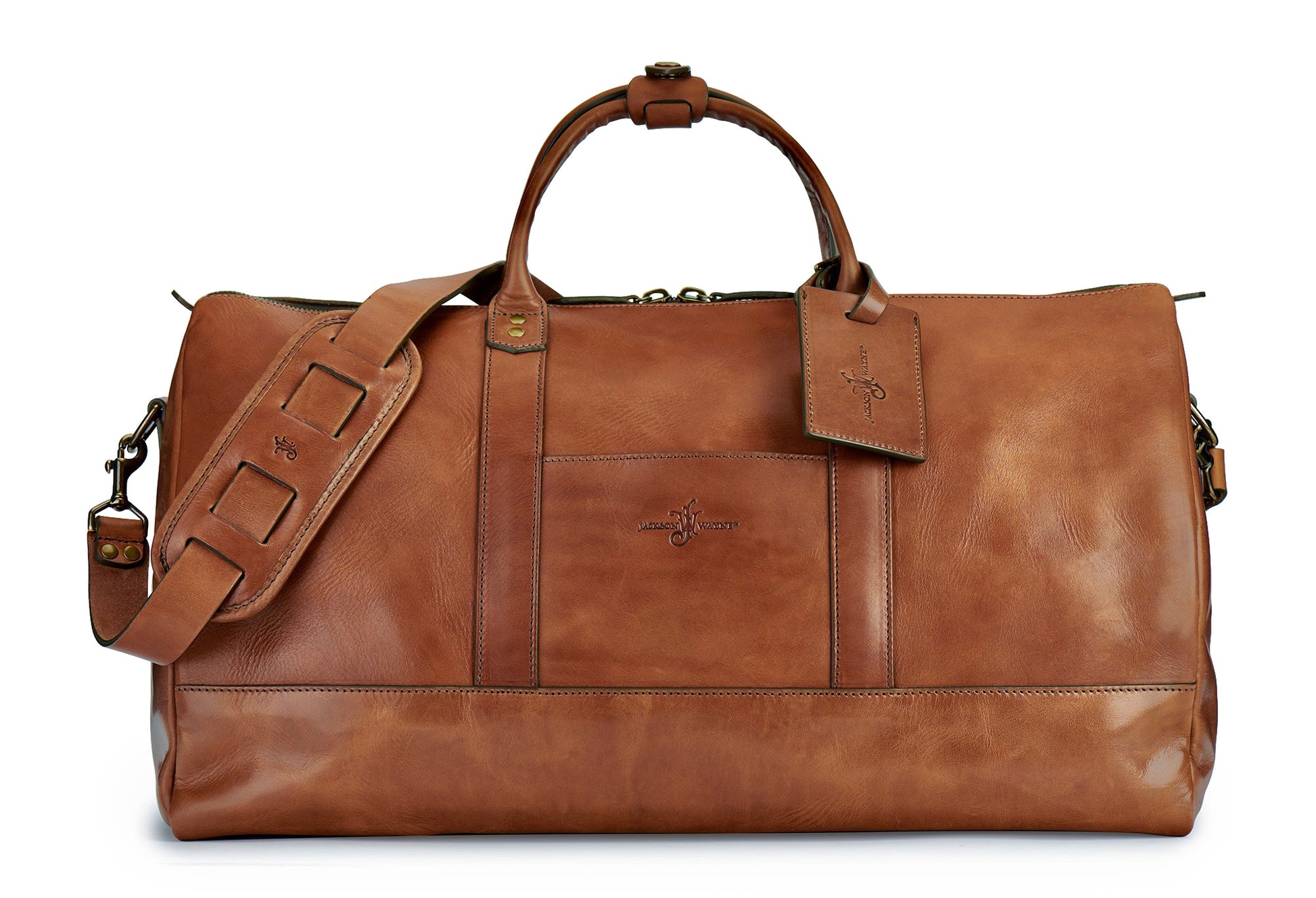saddle tan full grain leather weekender bag with luggage tag in saddle tan