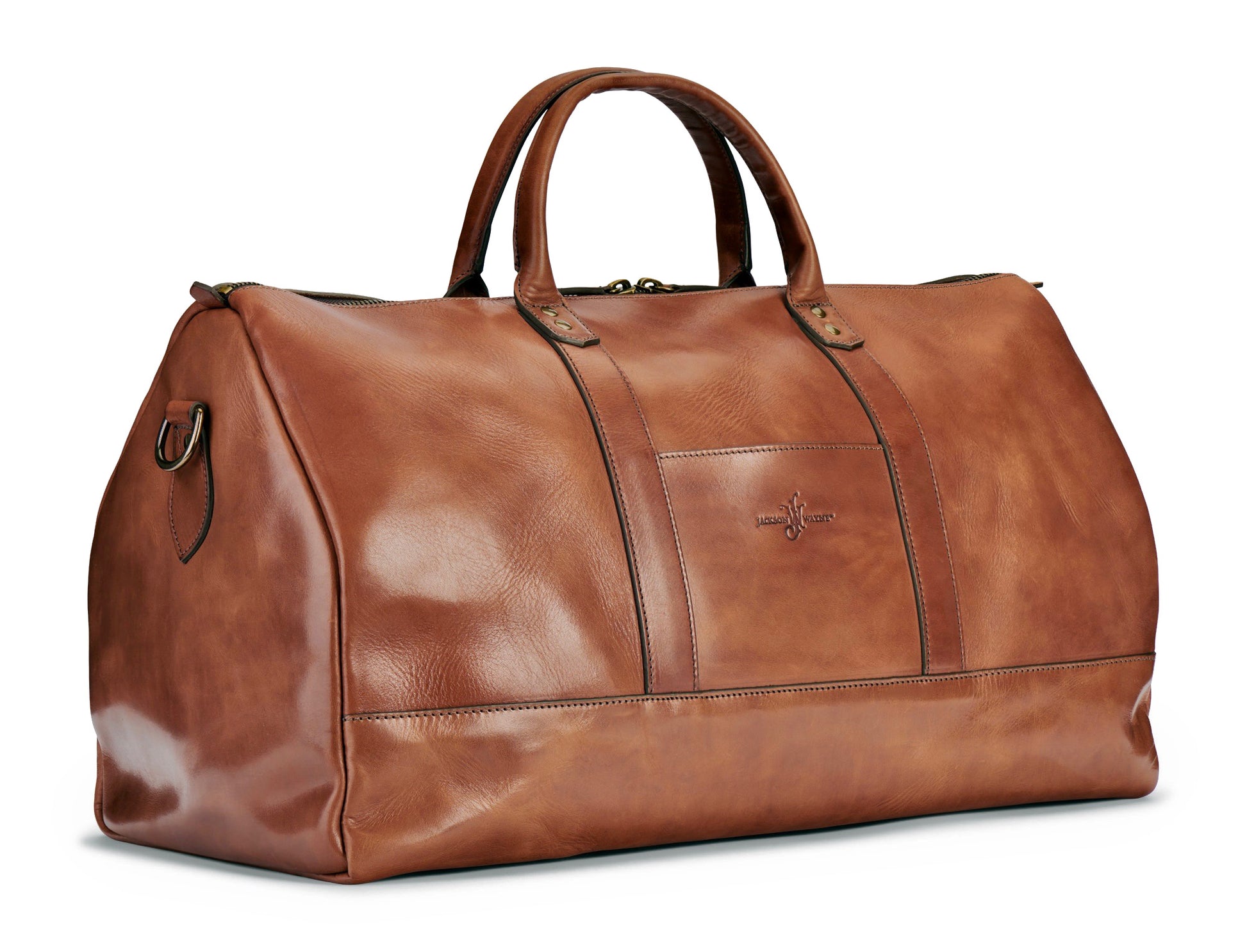 saddle tan full grain vegetable tanned leather duffel bag at angle