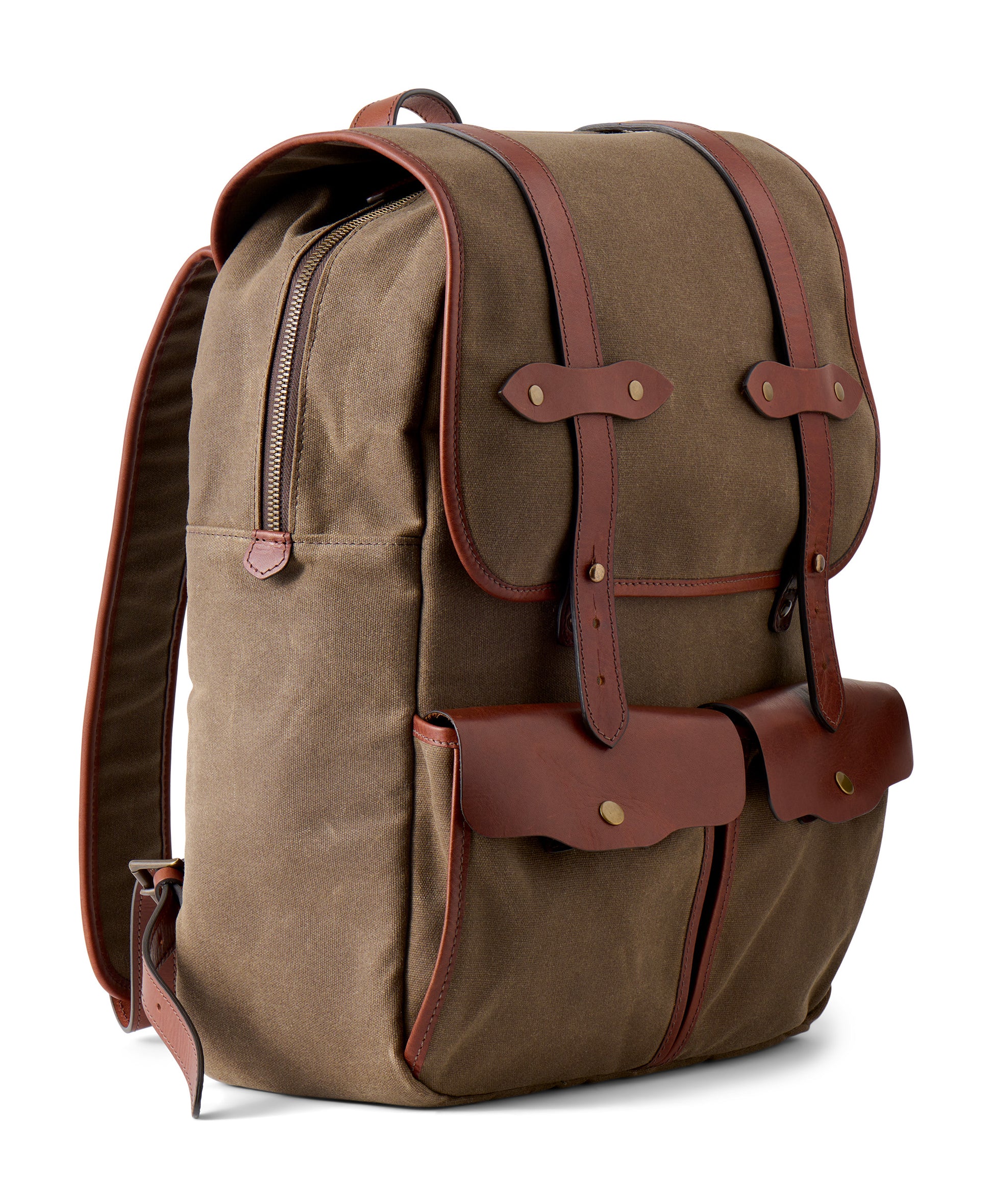men's leather and waxed canvas backpack side angle pictured in vintage brown full grain leather by Jackson Wayne