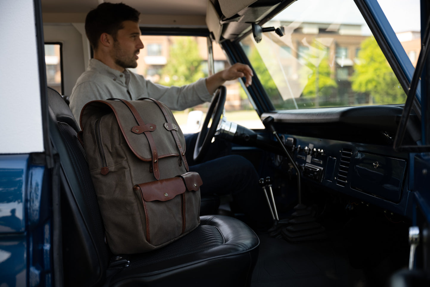 Founder's Backpack by Jackson Wayne - heritage martexin waxed canvas and full grain leather in vintage brown ford bronco passenger seat